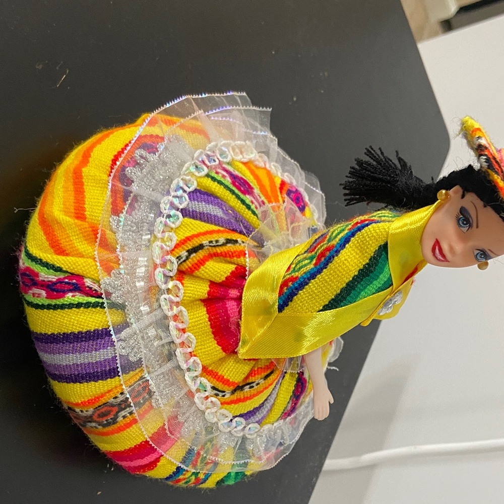 Peruvian souvenir doll that doubles as a decorative box or jewelry holder.